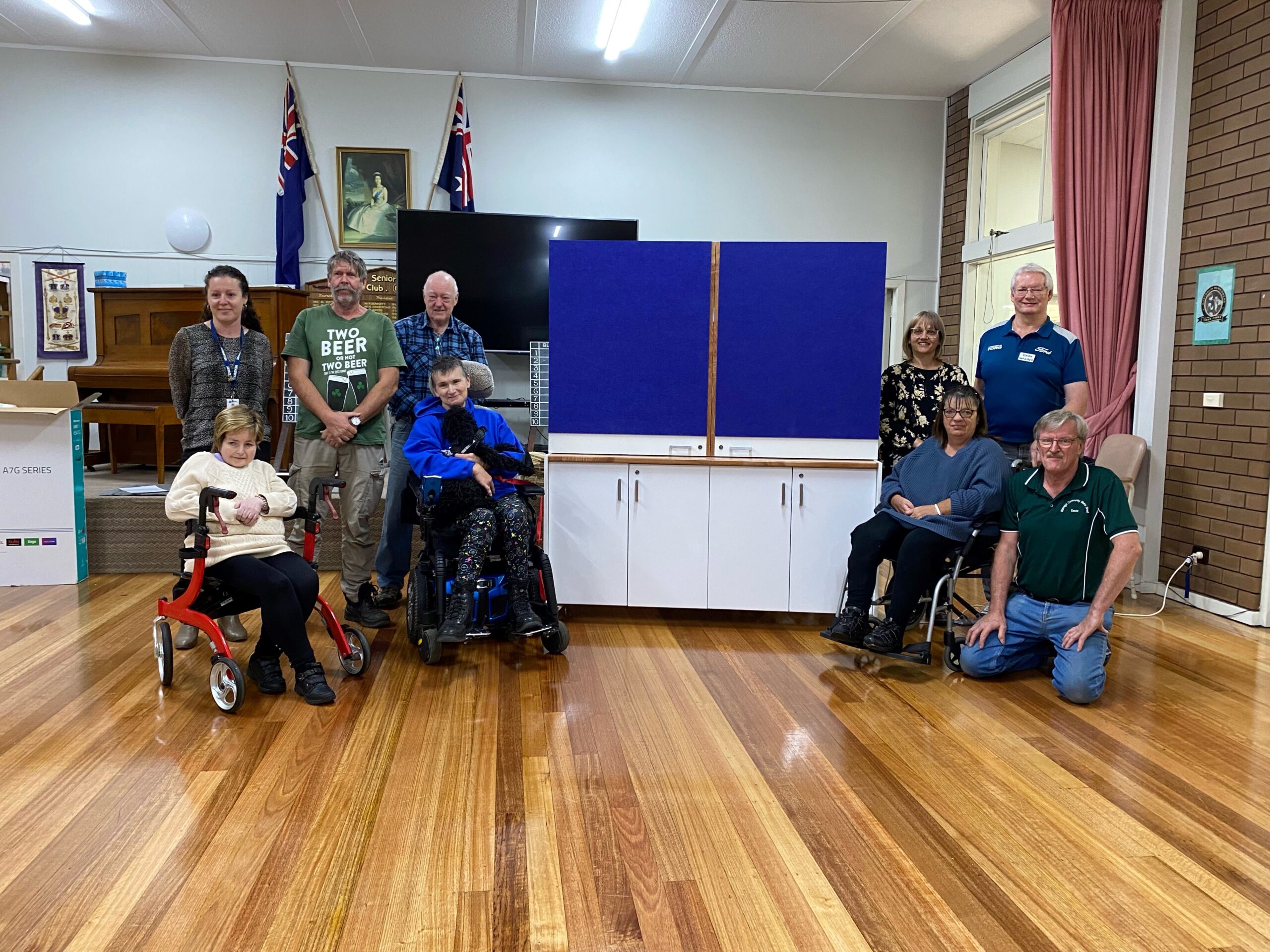 Mens shed donates TV cabinet to Warragul group